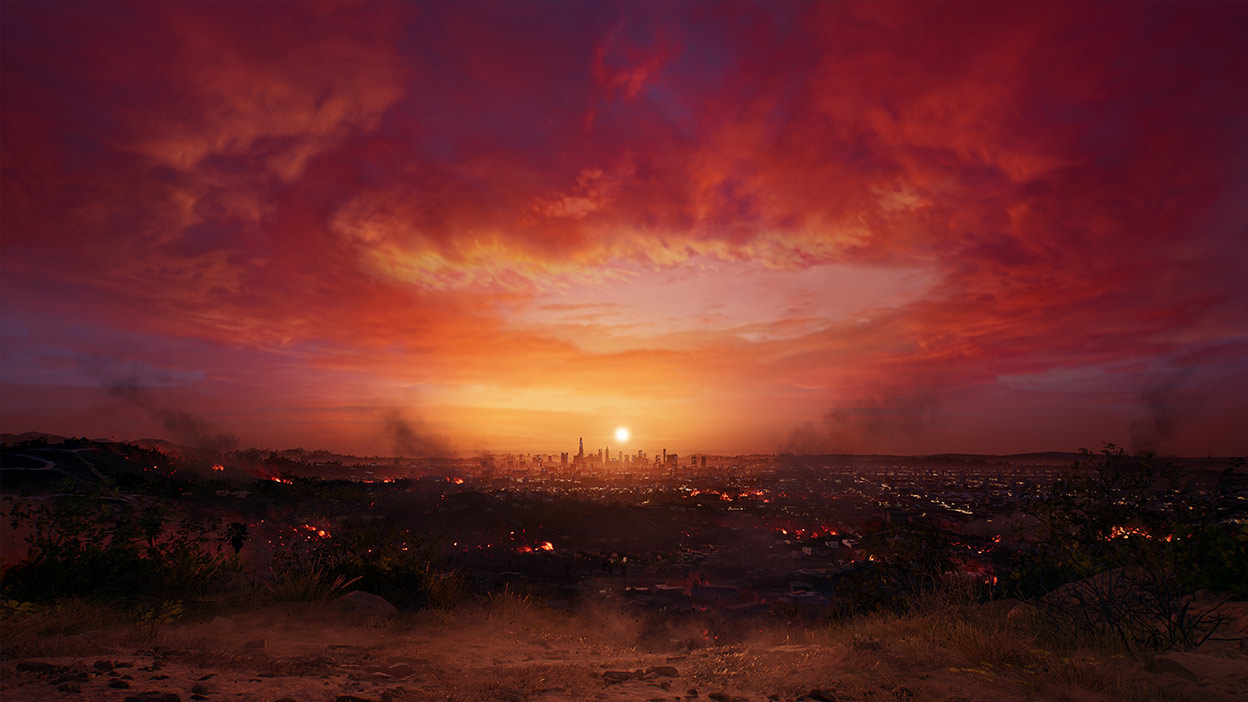 Le soleil se couche sur la Cité des Anges, illuminant le ciel et les nuages d’une lueur rougeâtre et orange.