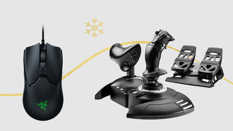 A gaming mouse and a racing wheel against a holiday background.