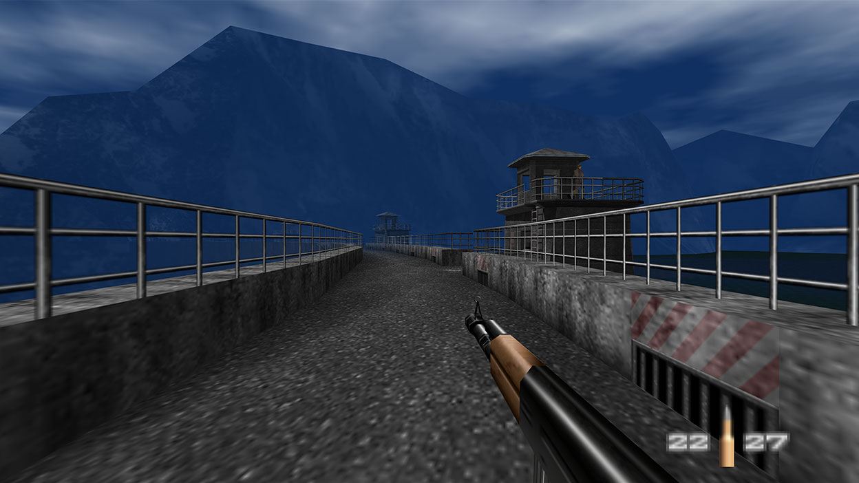 James Bond bevæger sig frem gennem et blotlagt rækværk, der ligger i skygge fra bjerge.