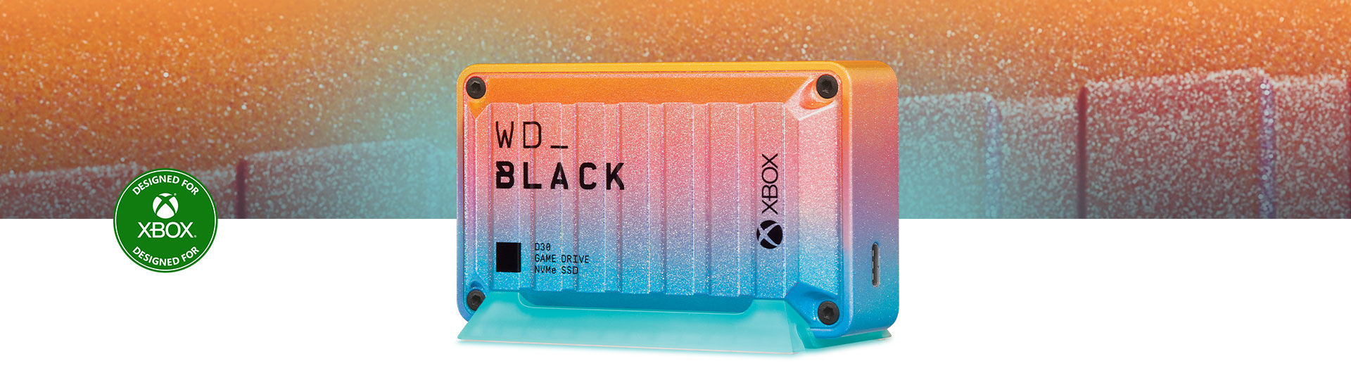Front view of the WD_BLACK D30 Game Drive SSD for Xbox – Sunset with close-up view in the background.