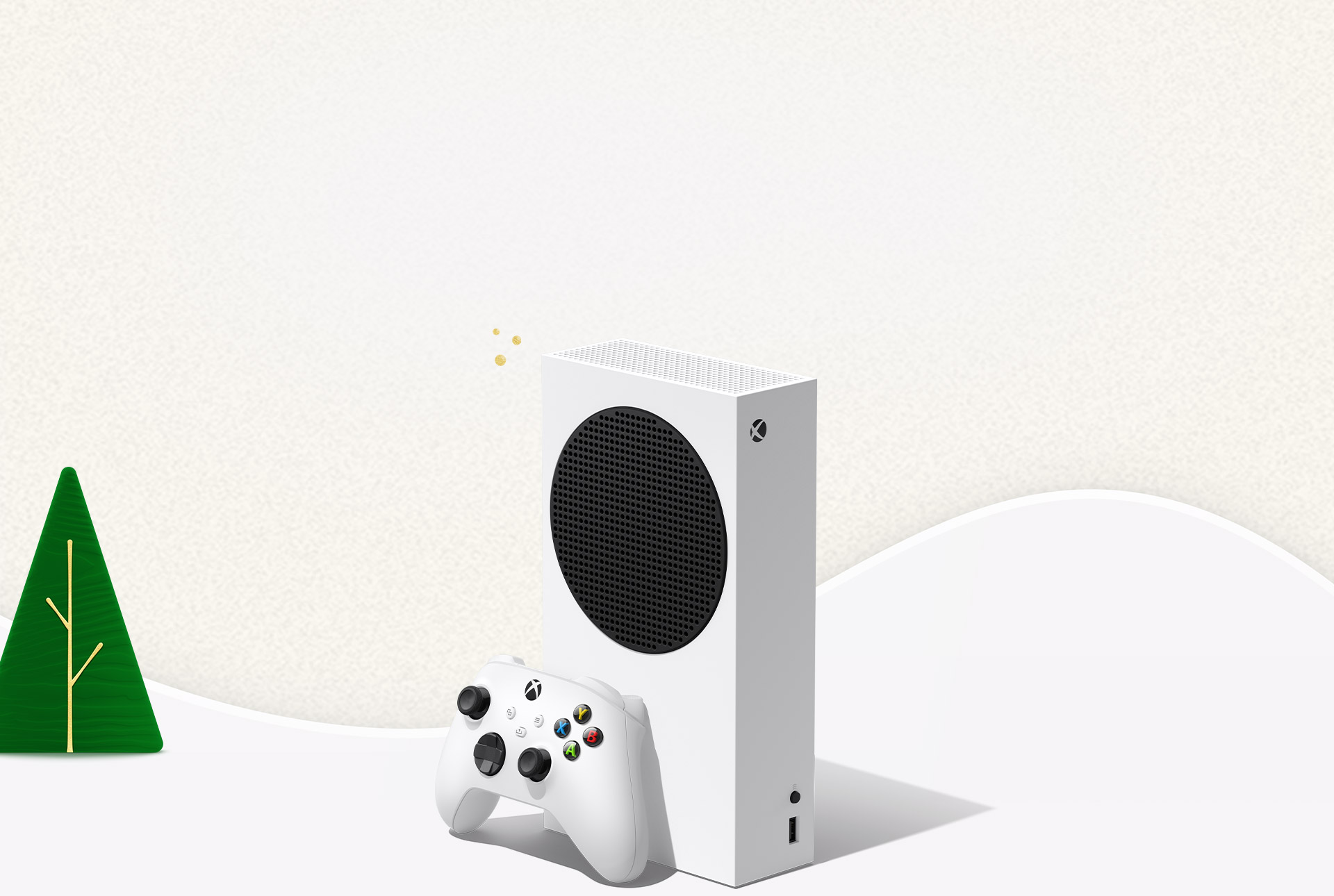Xbox Series S console and controller with a tree in the background