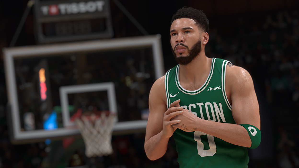 Jayson Tatum standing on the court in a number 0 Boston Celtics shirt.