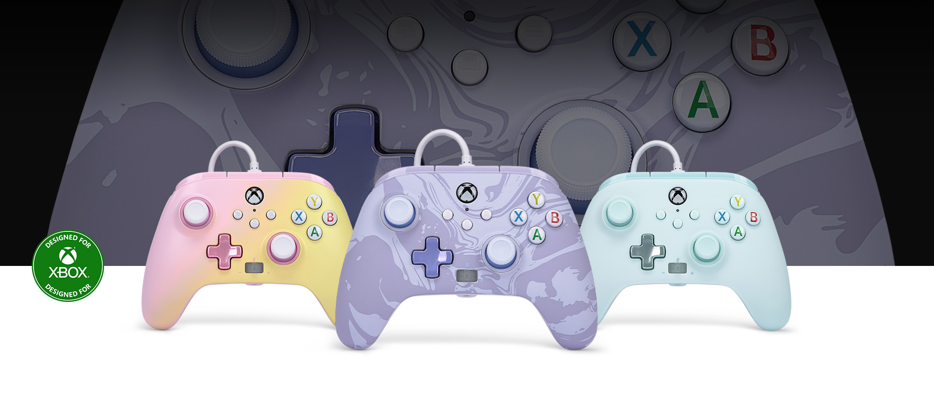 Designed for Xbox logo, Lavender Swirl controller in front with the Pink Lemonade and Cotton Candy Blue controllers beside it