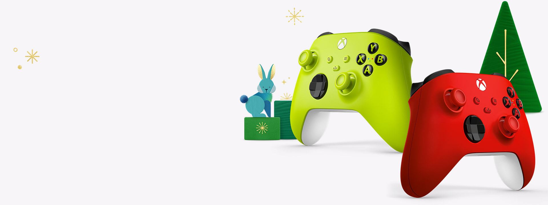 Two Xbox Wireless Controllers surrounded by holiday elements, including a rabbit, gifts, and a tree.
