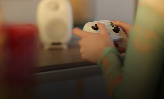 Close-up of someone using an Xbox controller