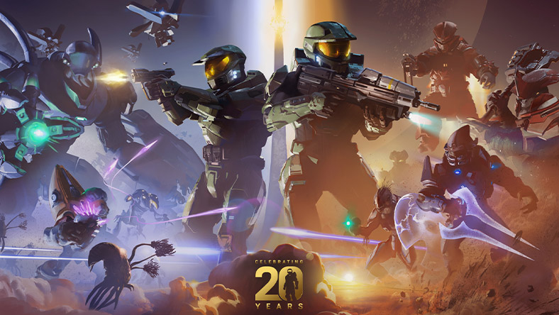 Two Spartans holding weapons with Covenant in the background