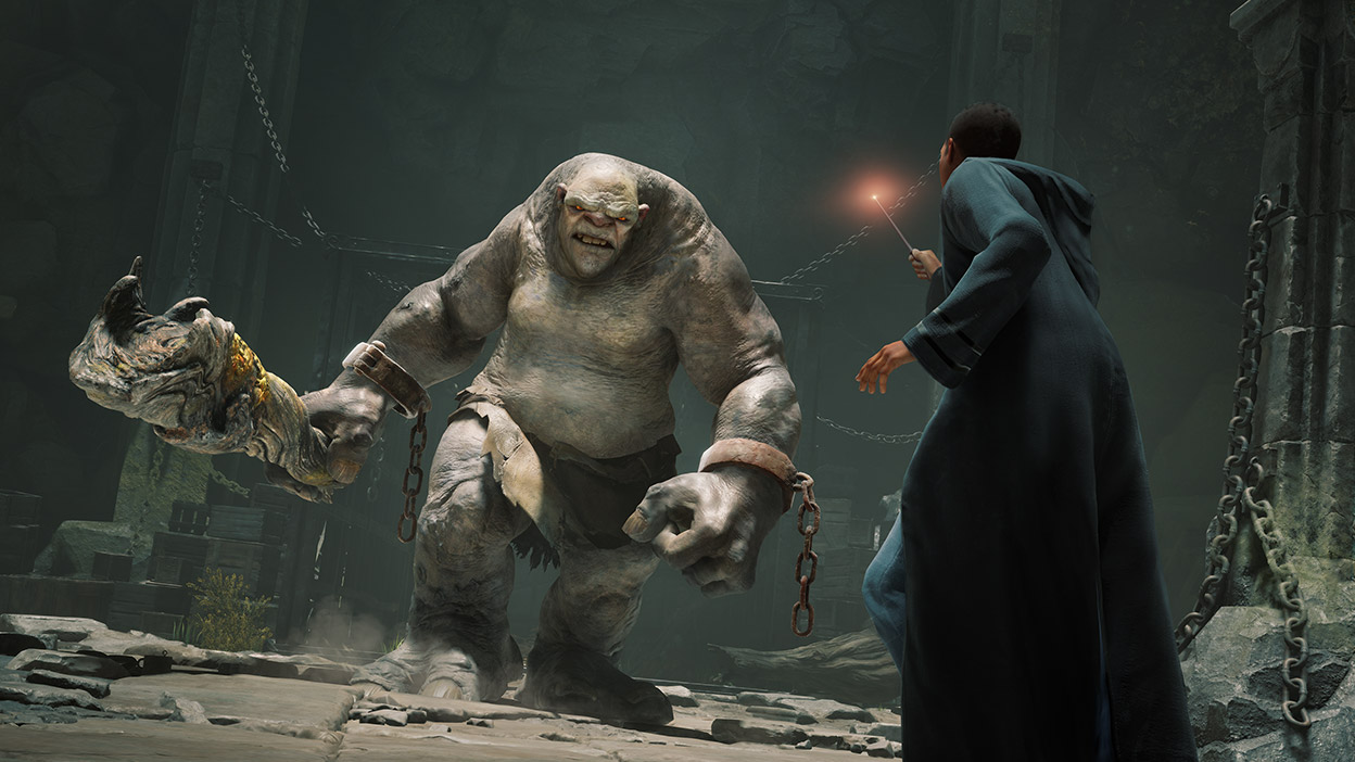 Un sorcier brandit sa baguette face à un troll géant menaçant.