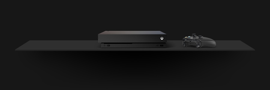 Eine Xbox One X-Konsole und Controller