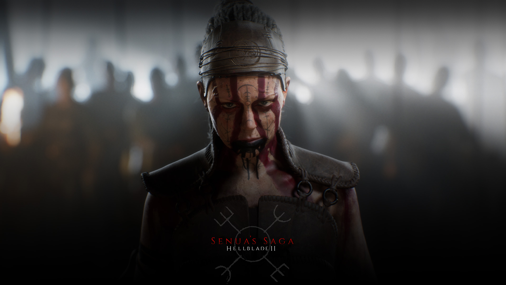 Senua’s Saga: Hellblade 2, Woman with face paint and tattooed markings stares intently in front of a group of people