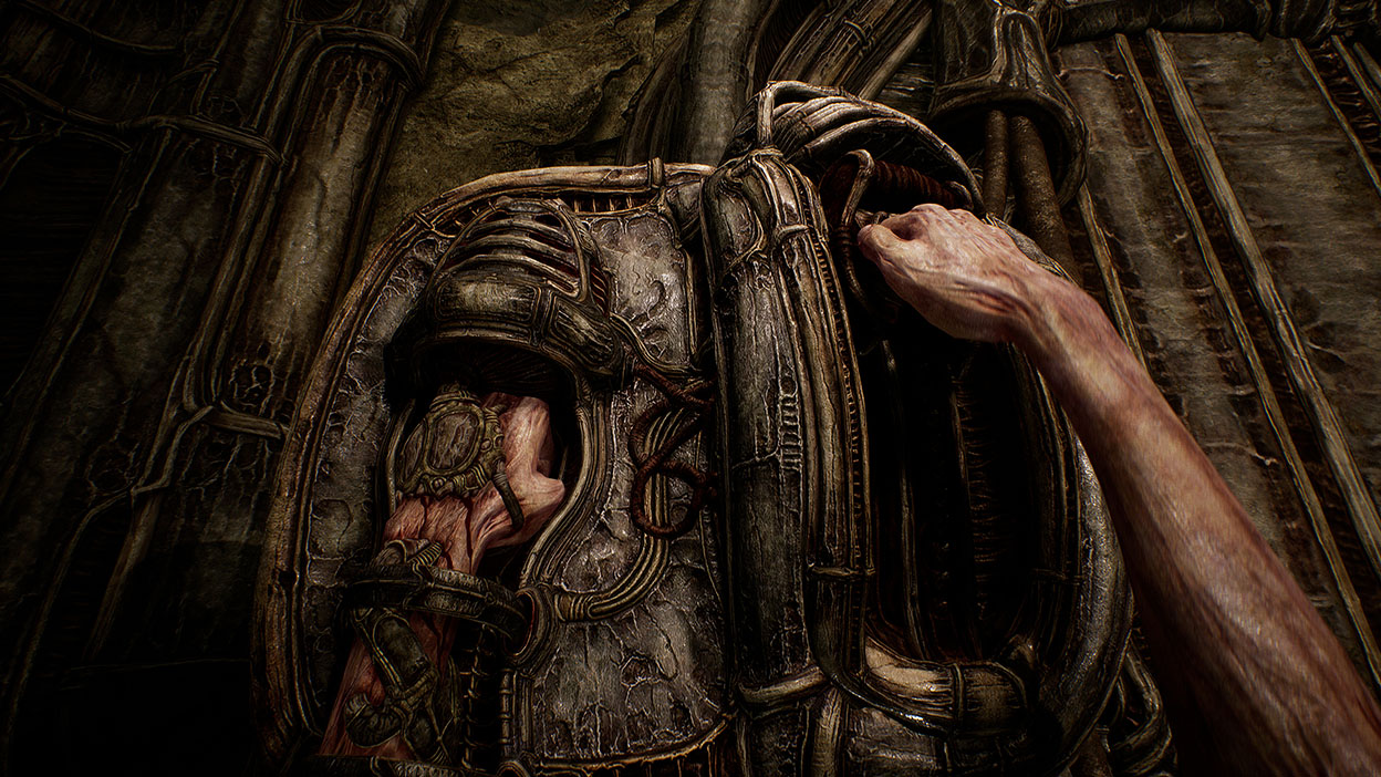 The protagonist’s hands manipulate an elaborate lever.