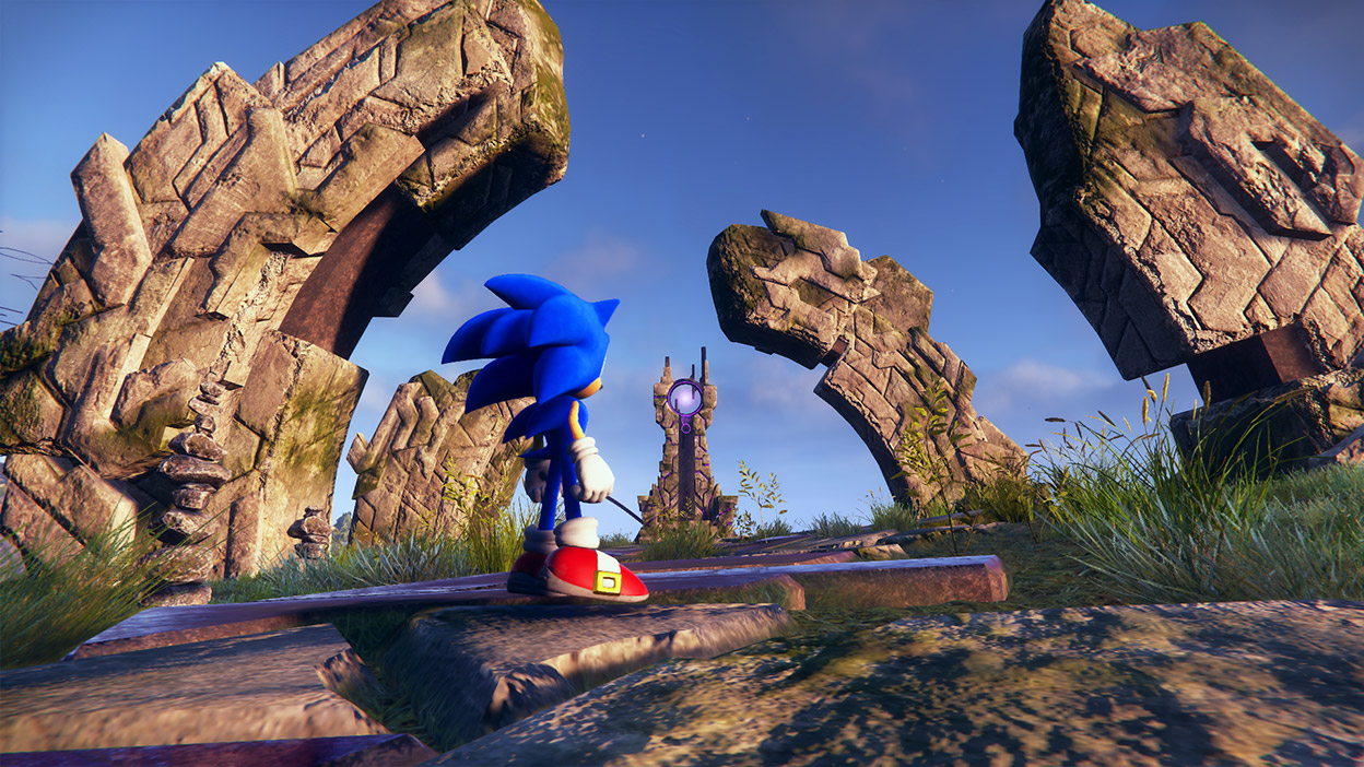 Sonic esplora rovine di pietra scolpita, con grandi pilastri incurvati attorno a un monumento viola.  