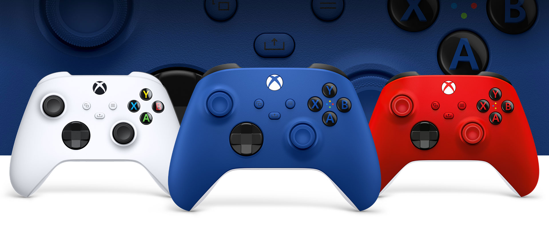 Xbox Shock Blue controller in front with the Robot White on left and Pulse Red on right