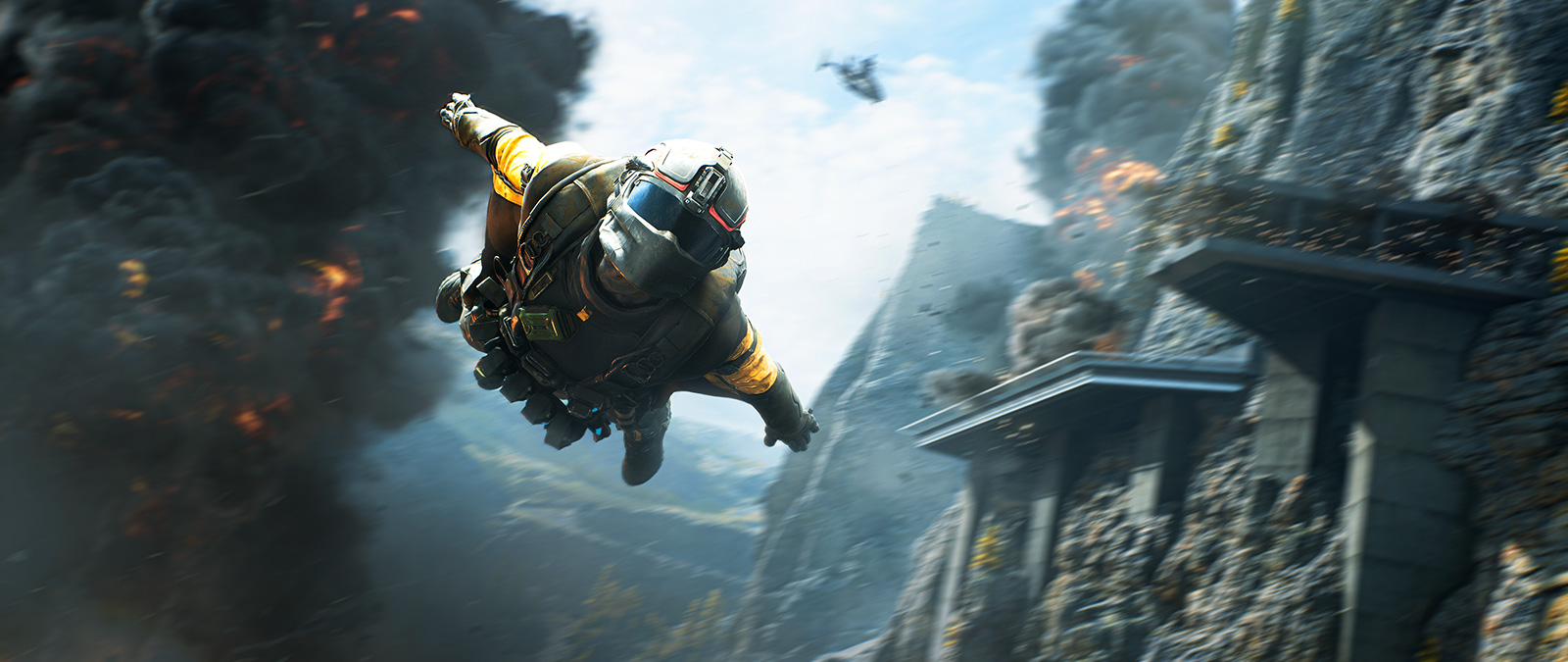 A person base-jumps through a canyon, narrowly missing explosions behind them.