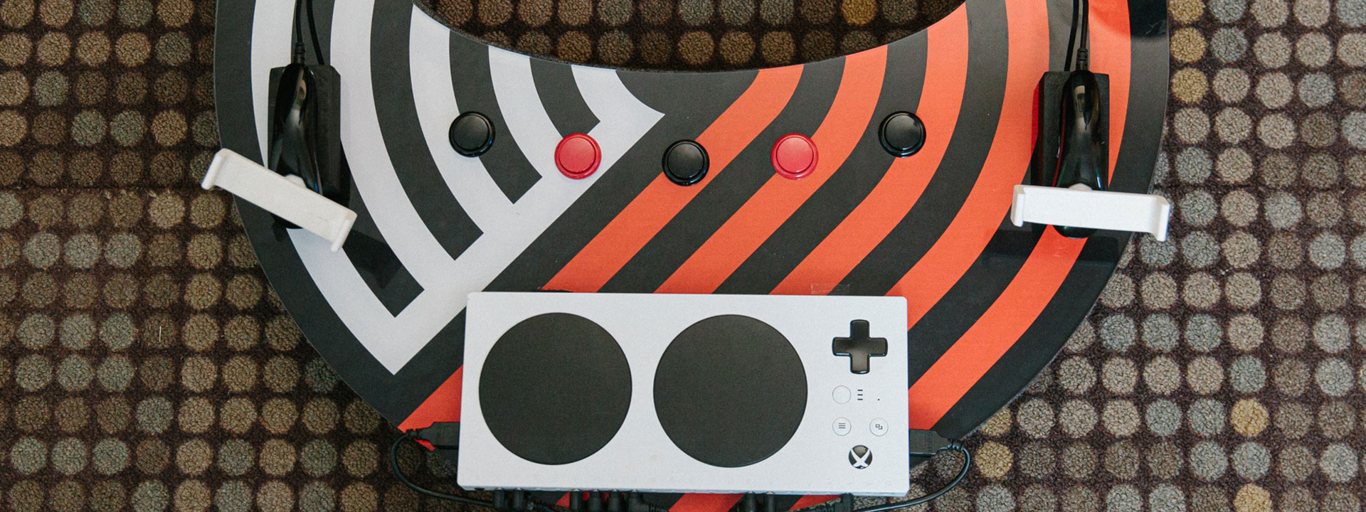 Xbox adaptive controller on a custom gaming setup.