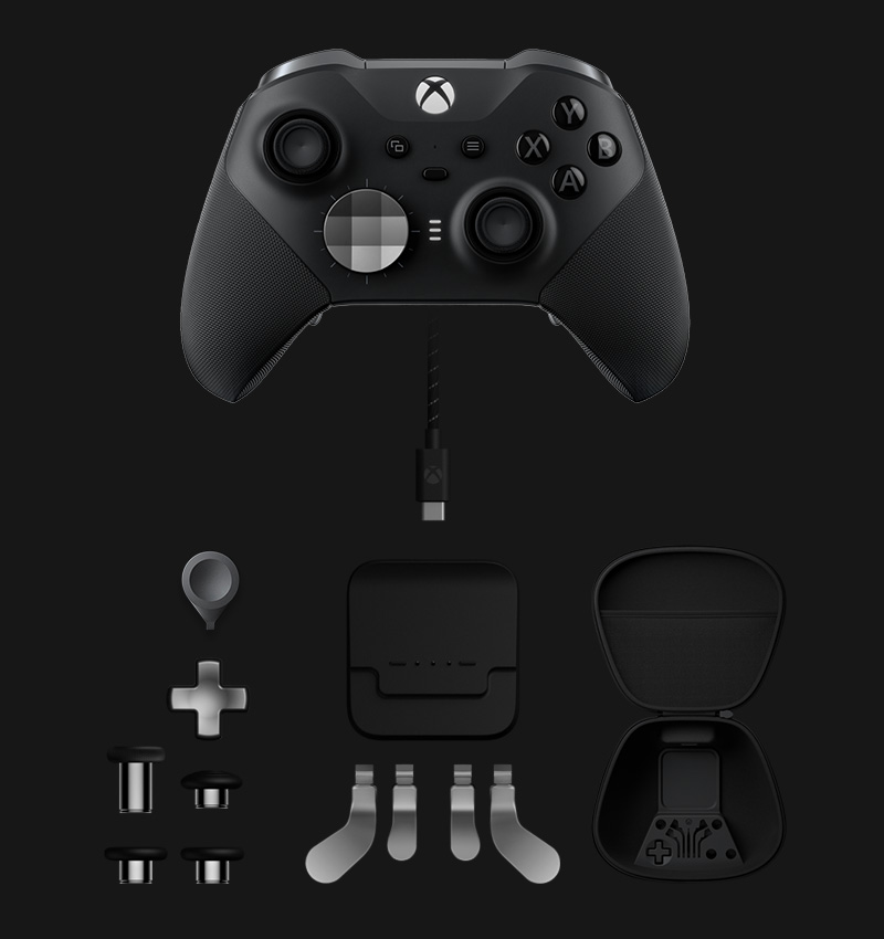 Bezprzewodowy kontroler Xbox Elite Series 2 ze wszystkimi elementami wchodzącymi w skład zestawu: wymiennymi drążkami, klasycznym padem kierunkowym, narzędziem do regulacji drążków, bazą ładującą, kablem USB-C, zestawem łopatek i futerałem.