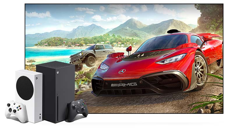 The Xbox Series S and Xbox Series X in front of a large display with key art from Forza Horizon 5