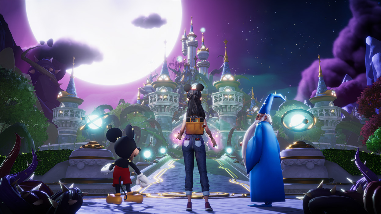 A player stands with Mickey and a wizard, looking towards a tall city at night. 