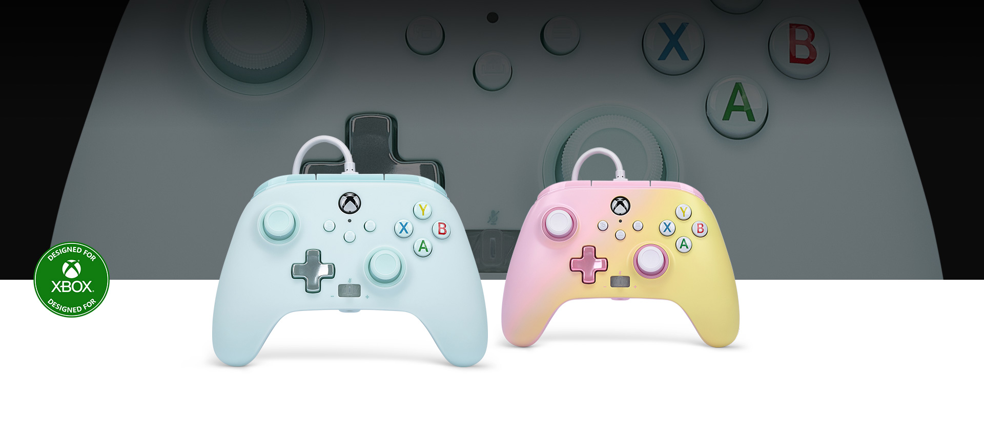 Designed for Xbox logo, Cotton Candy Blue controller in front with the Pink Lemonade controller beside it