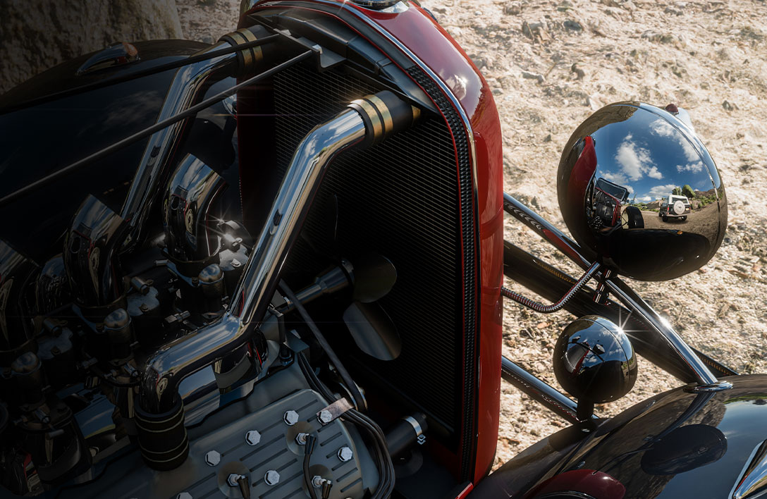 Forza Horizon 5. Baksidan av en kromrubrik reflekterar den omgivande spelvärlden med en DirectX-strålsökning.