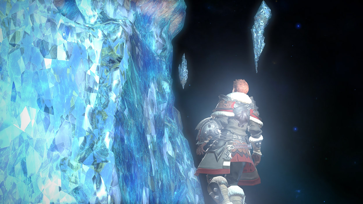 Een personage kijkt omhoog naar een muur van gloeiend kristal.