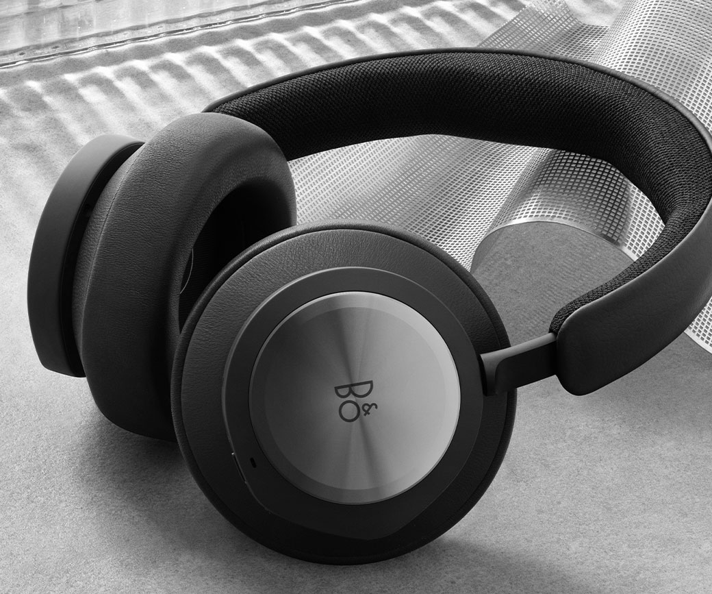 Close up angled view of the Bang and Olufsen black headset