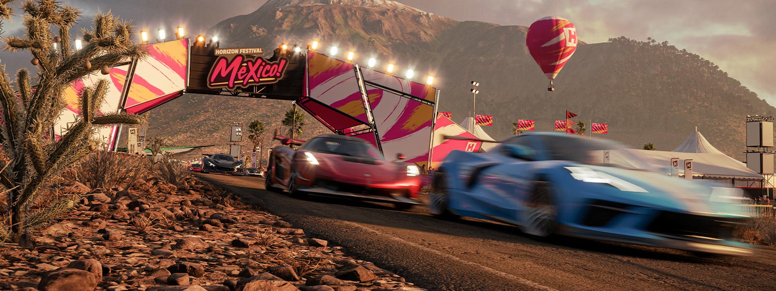 Three cars racing on the Mexico Forza Horizon 5 track