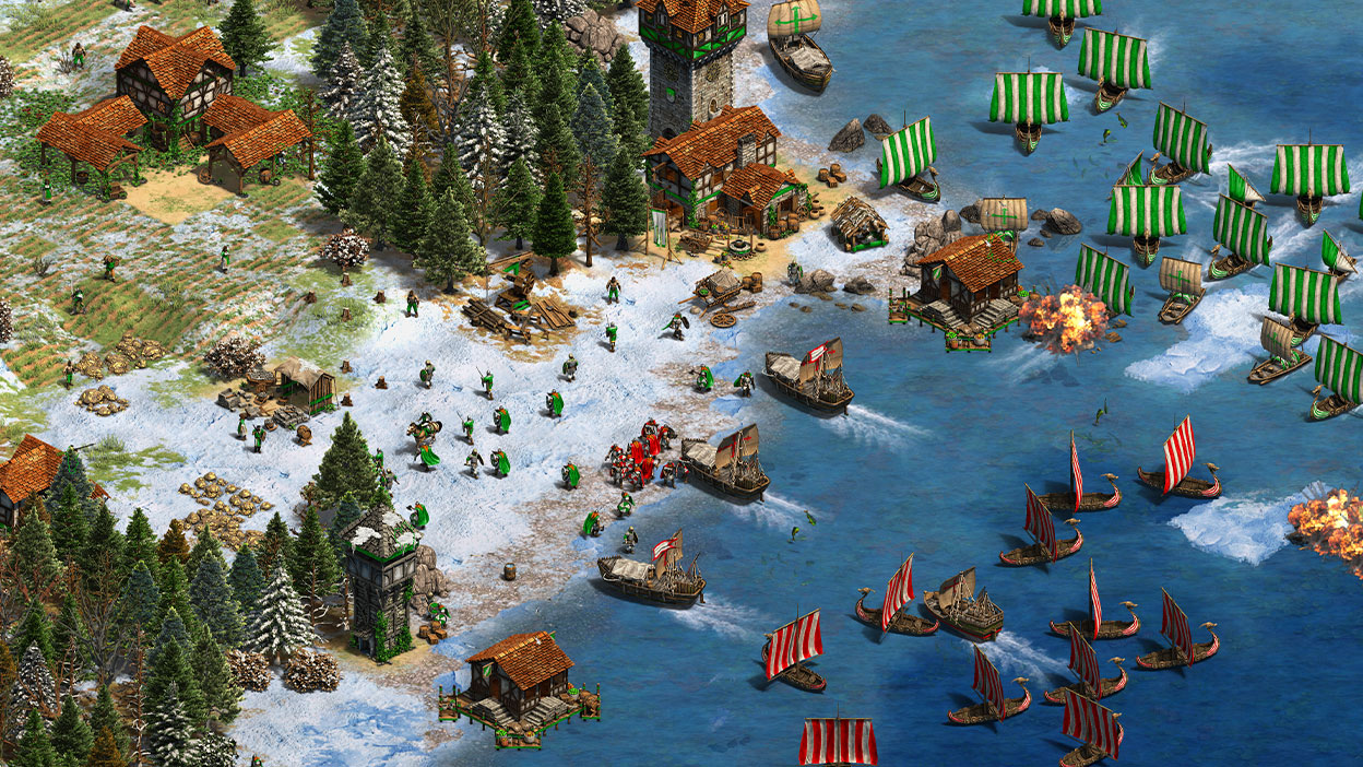 A red army with ships invading a snowy shore while a green army flanks and attacks at the same time.