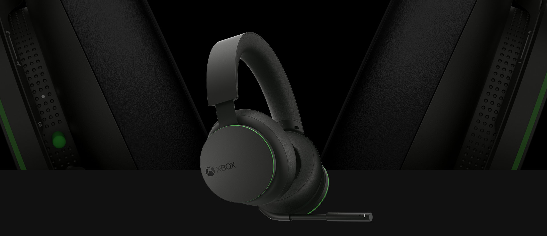 Front angled view of the Xbox Wireless Headset. A larger detailed view of the earcups is pictured behind the headset.