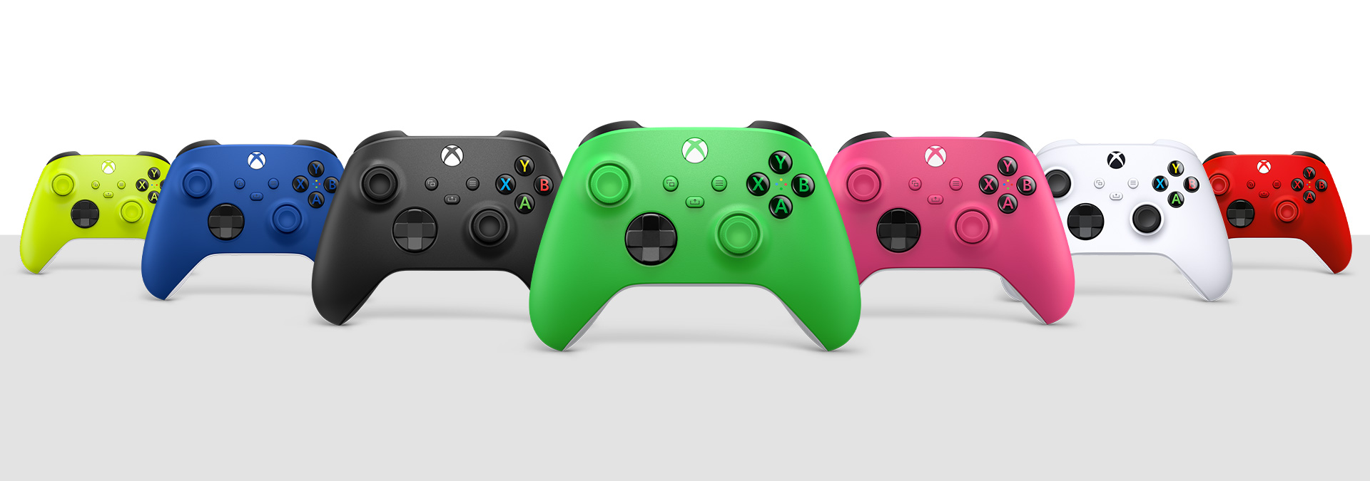 荧光绿、冲击蓝、磨砂黑、绿色、深粉色、冰雪白和锦鲤红 Xbox 无线控制器