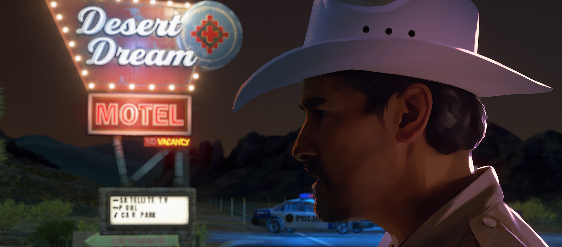 En polis i cowboyhatt står under en neonupplyst motellskylt.