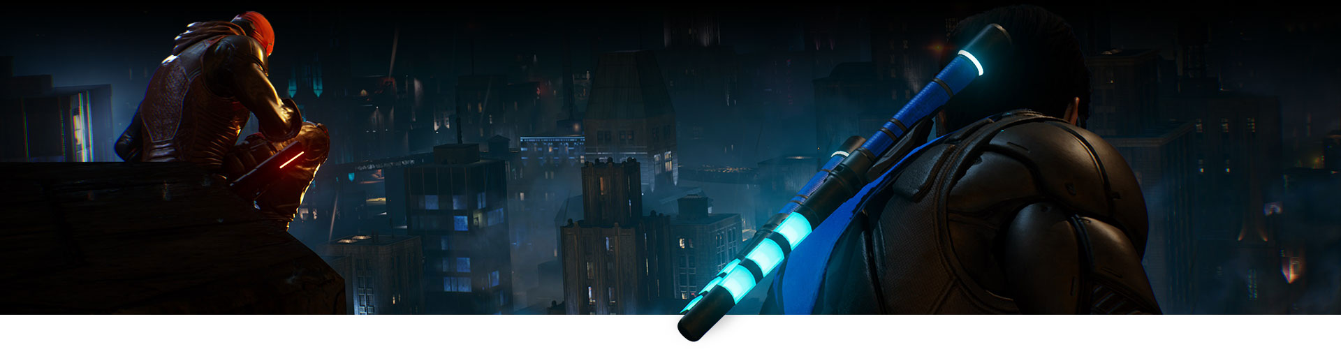 Cappuccio Rosso e Nightwing sono seduti su un tetto affacciato sulla città.