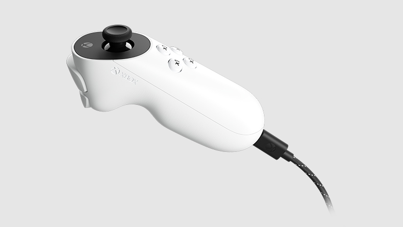 En sidovy av Xbox Adaptive Joystick