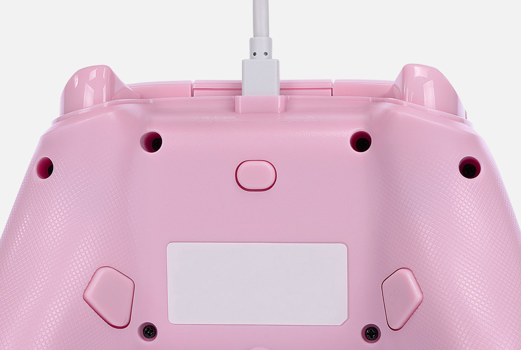 Close-up of the mappable buttons on back of the Pink Lemonade controller