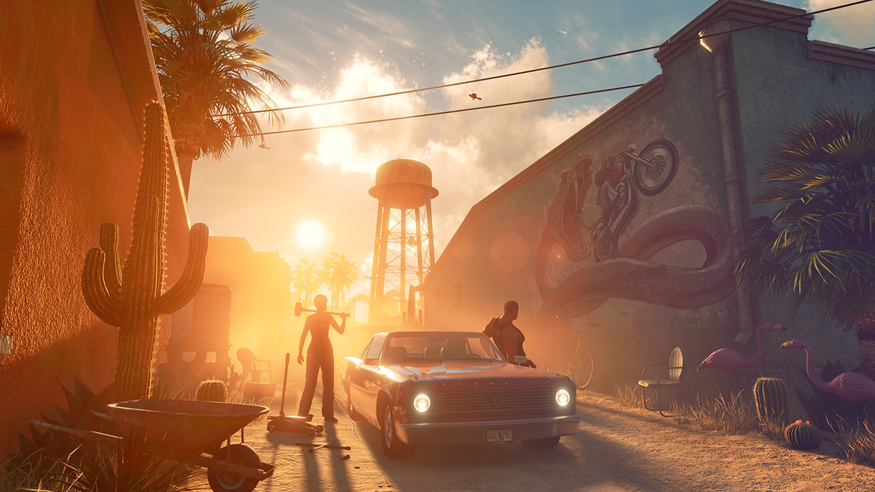 Dois personagens posam ao lado de um muscle car durante o pôr do sol.