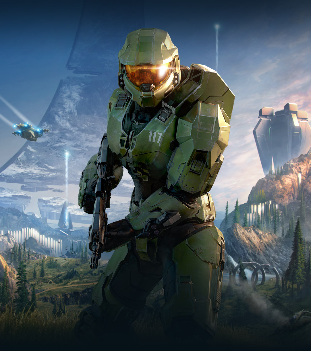 Halo Infinite, Animation von Master Chief mit Blick nach vorne in einem üppigen Tal mit einem zerbrochenen Halo-Ring hinter ihm