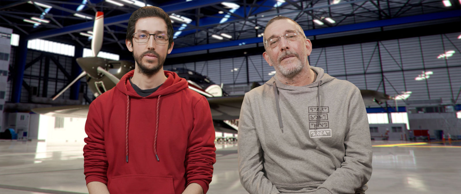 Jose et João Antunes parlent devant un avion