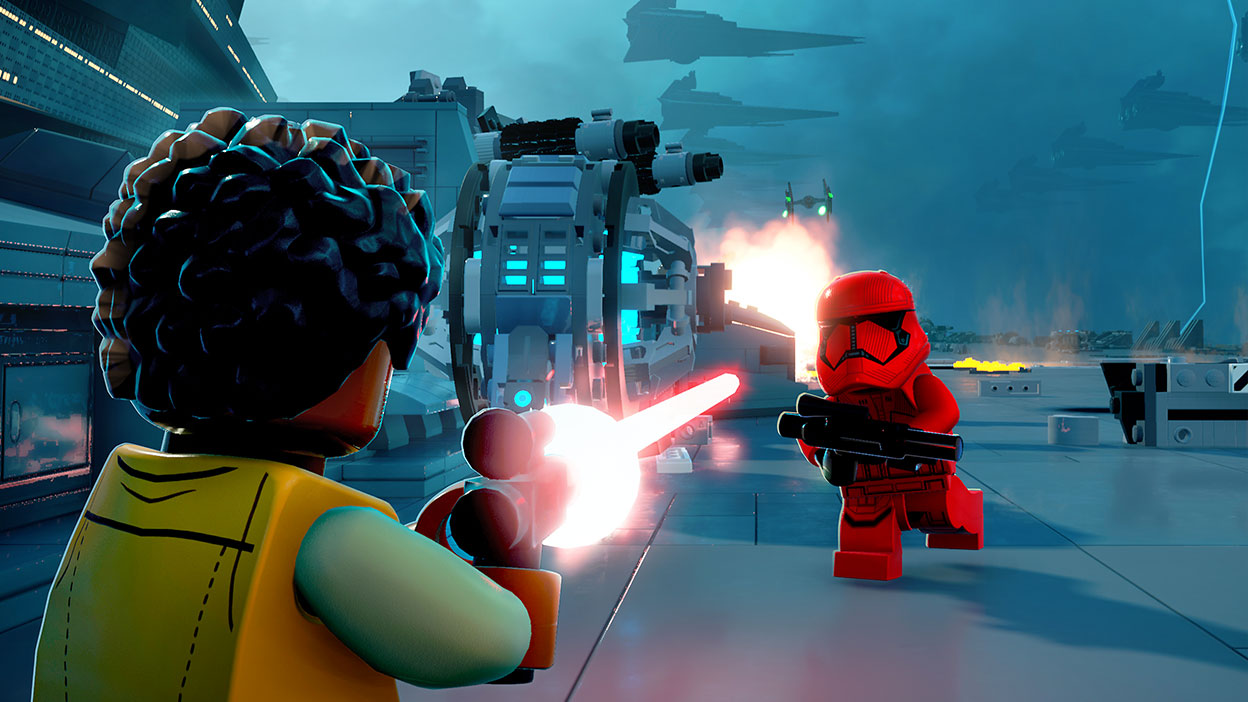 Finn schiet op een Sith Trooper met een vloot Star Destroyers op de achtergrond.