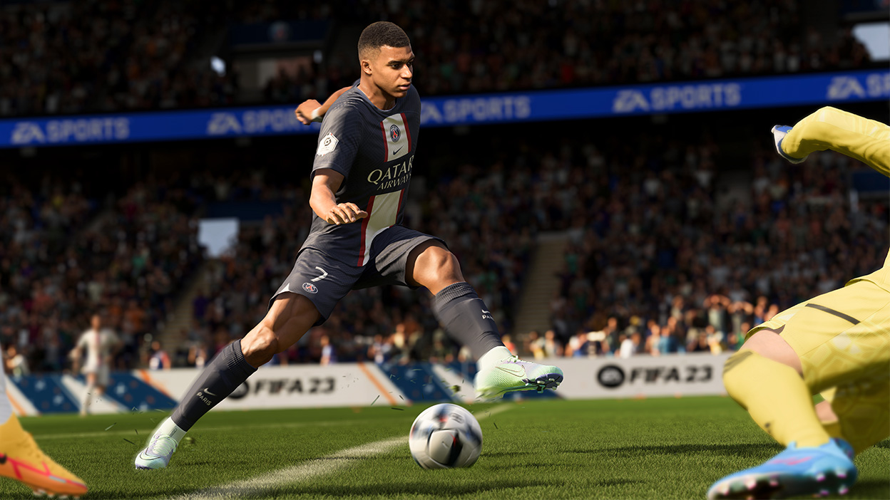 A player shows off fancy footwork as a defender slides in.