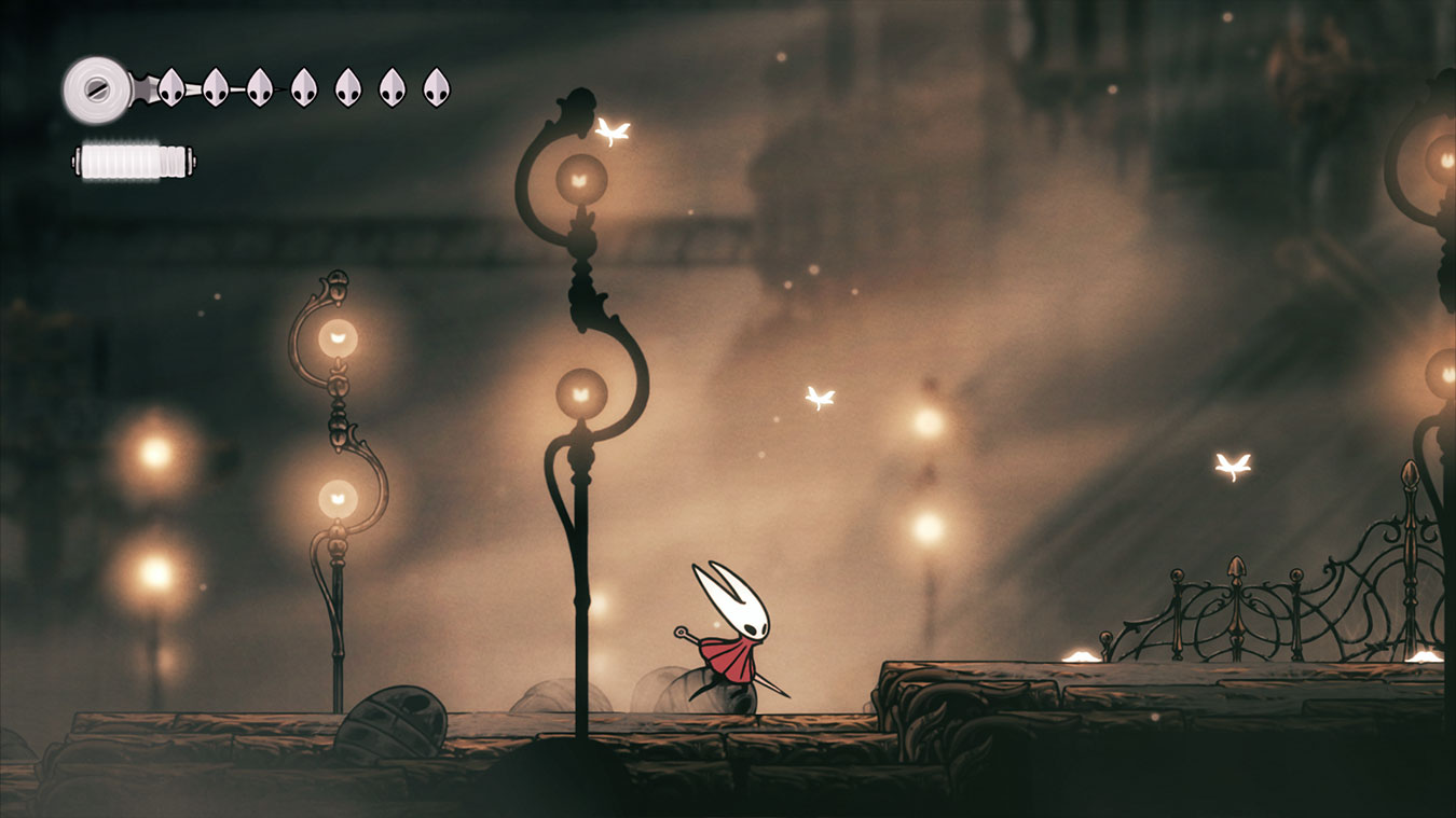 update main gallery with image: A character in a white mask and red cape runs through a foggy street. 