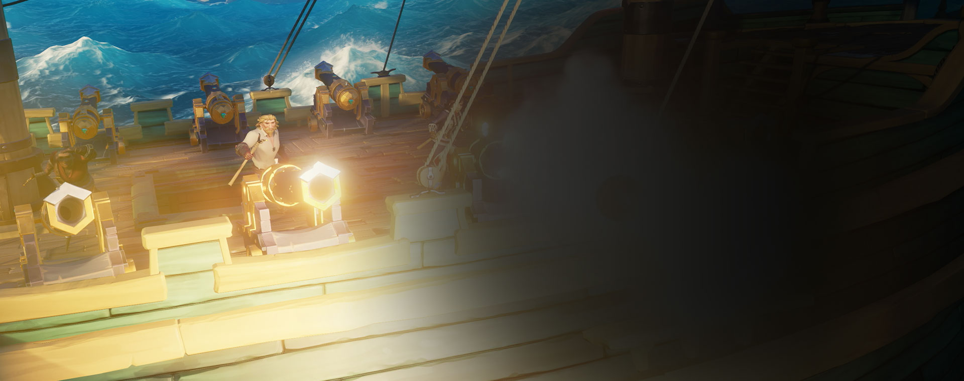 Sea of Thieves'ten karakterler, bir gemideki topları ateşliyor