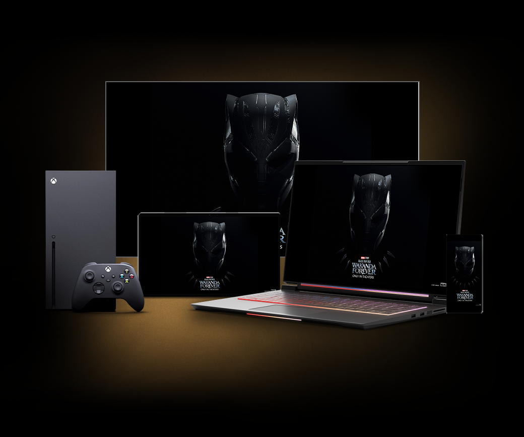 An Xbox Series X with a tablet, laptop, and mobile device, all displaying the new Black Panther: Wakanda Forever wallpaper