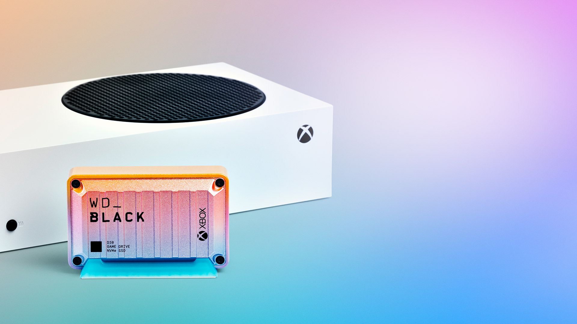 The WD_BLACK D30 Game Drive SSD for Xbox – Sunset with the Xbox Series S in the background.