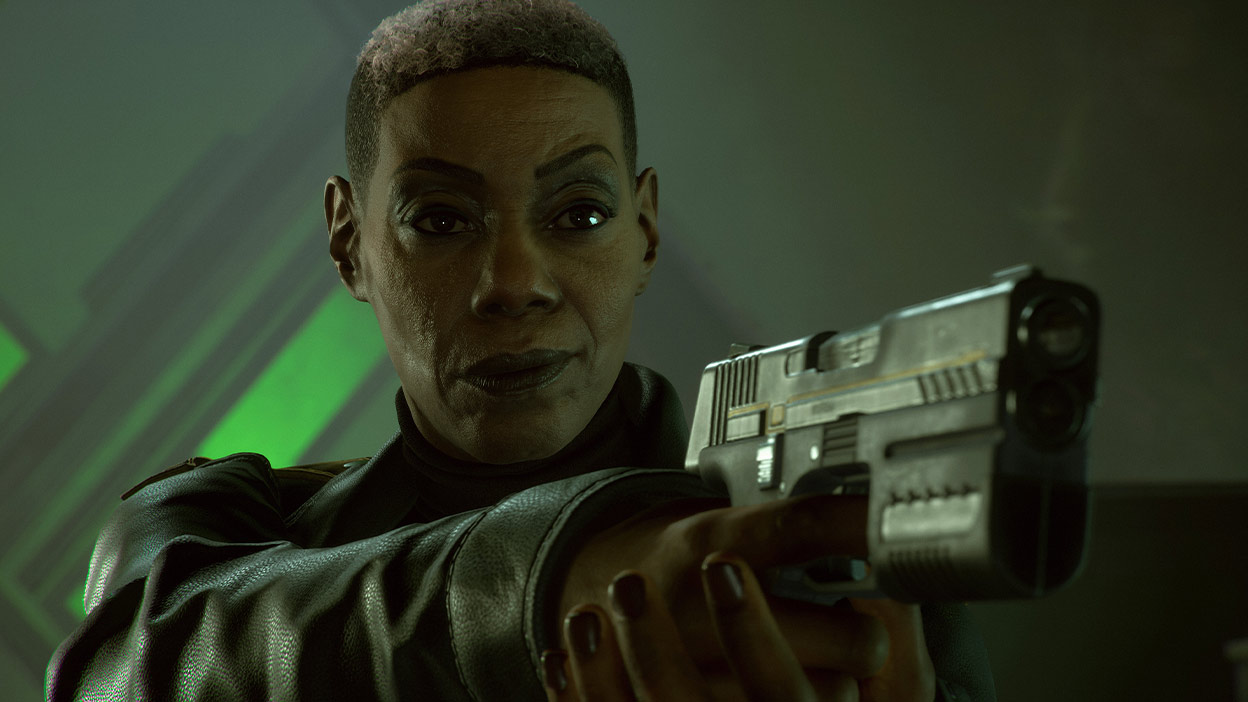 Amanda Waller arches her eyebrow while keeping her firearm carefully raised.