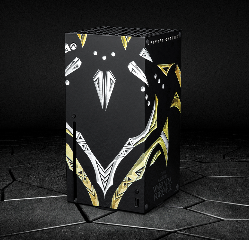 A custom Wakanda-forever inspired Xbox Series X with gold and white patterning from the new Black Panther costume 